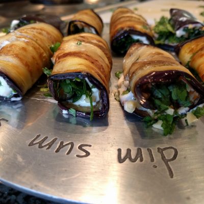 Eggplant rolls with walnuts and fresh herbs
